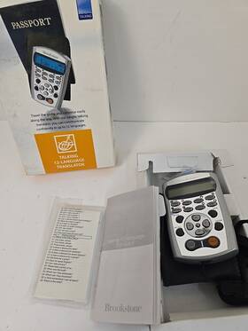 0000433433 Brookstone Talking Twelve Language Translator By