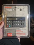 Unisonic Word Pro 305N Spell Man 1989 Mini Computer Calculator Dictionary Works. Fixed Price $25.00.