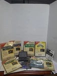 Franklin Bookman Cartridge Lot 7. + Manuels Advanced Dictionary & Thesaurus. Fixed Price $200.00.