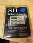 Seiko Instruments Sii Personal Organizer DF3400 W/storage Case. Fixed Price $10.15.