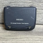 Seiko 6 Language Translator Model DF-4033 Travel Alarm Organizer Works. Fixed Price $22.49.