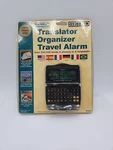 Seiko 6 Language Translator Model DF-4033 Travel Alarm Organizer Vacation Black. Fixed Price $14.49.