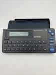 Vintage 1988 Texas Instruments English Hand Held Spell-checker RR-1 With Cover. Fixed Price $8.00.