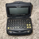 Seiko DF4033 6-LANGUAGE Pocket Translator Travel Organizer Needs Battery. Fixed Price $13.99.