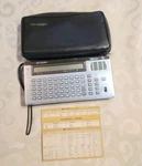 Sharp Iq 5000 Personal Organizer Translator Voice Synthesizer W/case (works). Fixed Price $40.00.