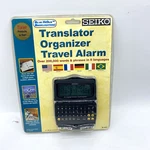 Seiko Model DF4033 Six Language Pocket Translator Travel Organizer Alarm. Fixed Price $18.71.