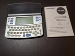 Sharp PW-E250 Pocket Oxford Spanish English Dictionary & Thesaurus. Fixed Price $20.00.