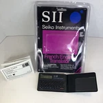 Seiko Instruments French English Translator Sii TR-2300 Handheld Working Vtg D3. Fixed Price $7.17.