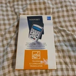 Brookstone Talking 12-LANGUAGE Digital Translator, Brand New. Fixed Price $15.99.