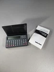 Vintage (1993) Radio Shack Four Language Translator 63-666. Fixed Price $8.95.