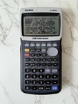 Casio FX-9860G Usb Power Graphic Calculator W/ Hard Cover Tested Working. Fixed Price $44.95.