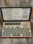 Franklin Pocket Official Electronic Mini Scrabble Players Dictionary Works. Fixed Price $37.95.