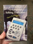 Sharper Image 12-LANGUAGE Talking Translator. Fixed Price $9.99.