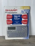 Sharp EL-6920B Personal Organizer Games Translator Calculator Schedule Memo+. Fixed Price $12.99.