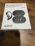 Yesohu AI-M127 Bluetooth Translator Earbuds Handheld Battery Powered. Fixed Price $35.00.