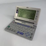 Sharp PW-E550 Electronic Dictionary Oxford American Thesaurus Grammar Reference. Fixed Price $24.99.