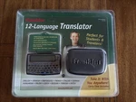 Franklin TG-450 12 Language Translator W/carry Case Handheld Portable Electronic. Fixed Price $35.00.