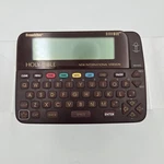 Franklin Bookman Electronic Holy Bible NIV640 And Crosswire Trivia Game Card. Fixed Price $24.99.