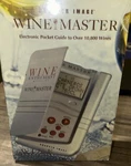 Master Electronic Pocket Guide To Over 10,800 Wines Sharper Image Sealed. Fixed Price $9.00.