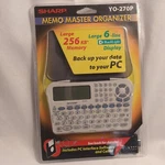 Sharp Electronic Memo Master Organizer YO-270P With Back Light New Sealed 2001. Fixed Price $17.85.