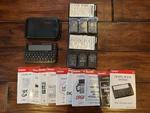 Franklin Digital Book System DBS-2 With 9 Cartridges. Fixed Price $40.00.