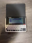 Franklin Merriam Webster Electronic Pocket Dictionary MWD-1490. Fixed Price $18.50.