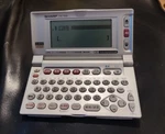 Sharp PW-7000 Genius Auto-paging & Scroll English Japanese Dictionary Work. Fixed Price $9.99.