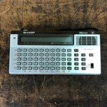 Sharp Iq 5000 Personal Organizer Translator Voice Synthesizer W/case (works). Fixed Price $149.95.