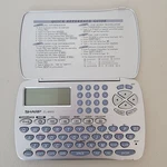 Sharp EL-6920 Memomaster Electronic Organizer Calculator Silver. Fixed Price $9.96.
