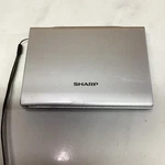 Junk Item Sharp PW-AC890 Electric Dictionary Silver. Fixed Price $100.00.